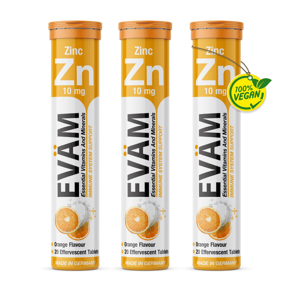 Three tubes of EVÄM Zinc 10 mg orange effervescent tablets with vegan badge, 20 tablets per tube, made in Germany.